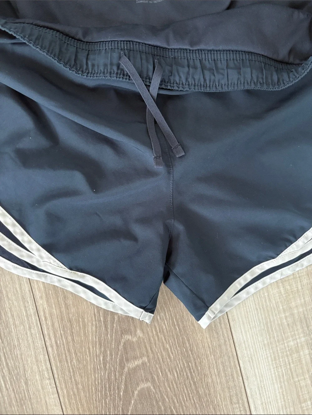 Nike Women's Navy Athletic Shorts with White Trim